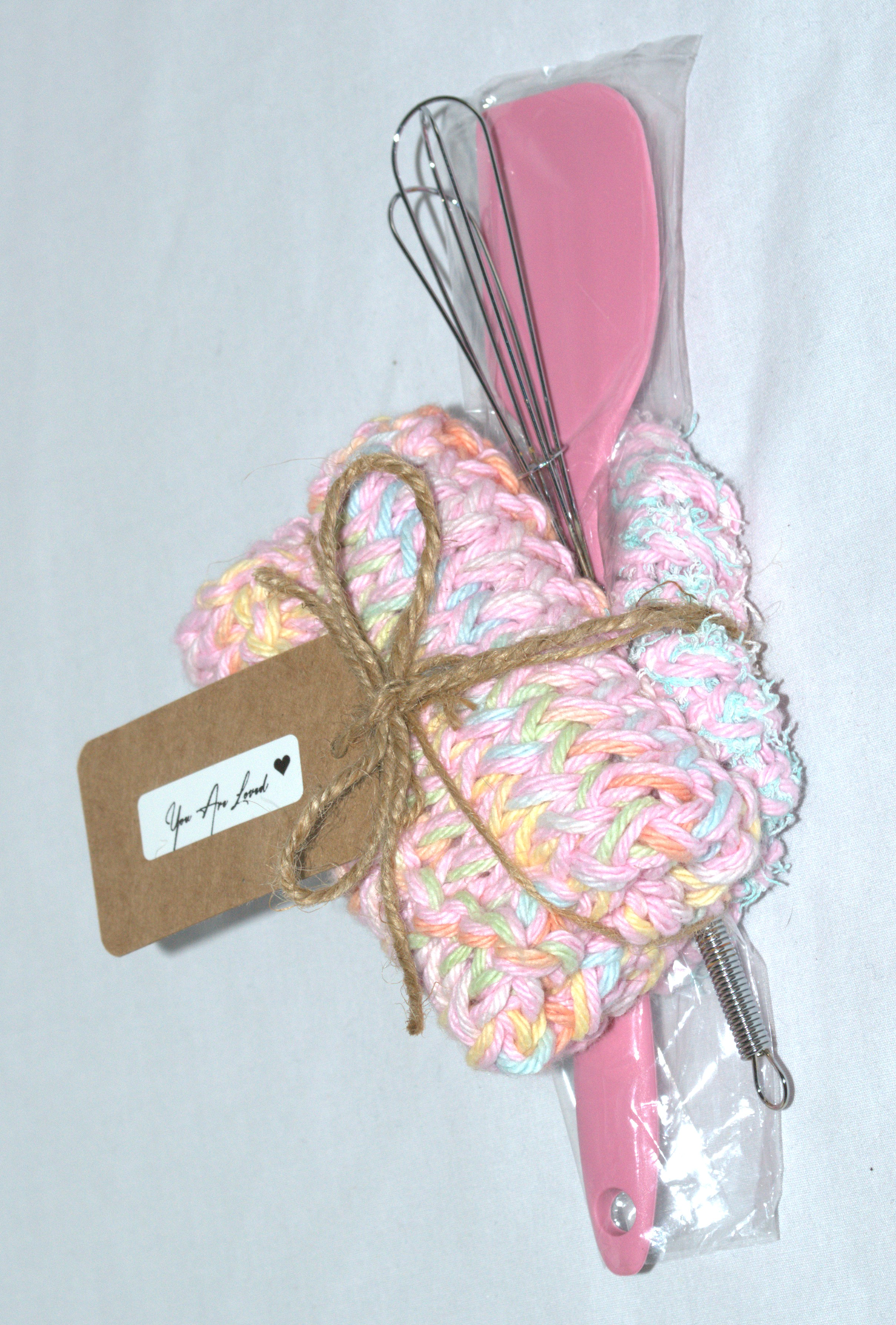 Pink Cloth and Whisk